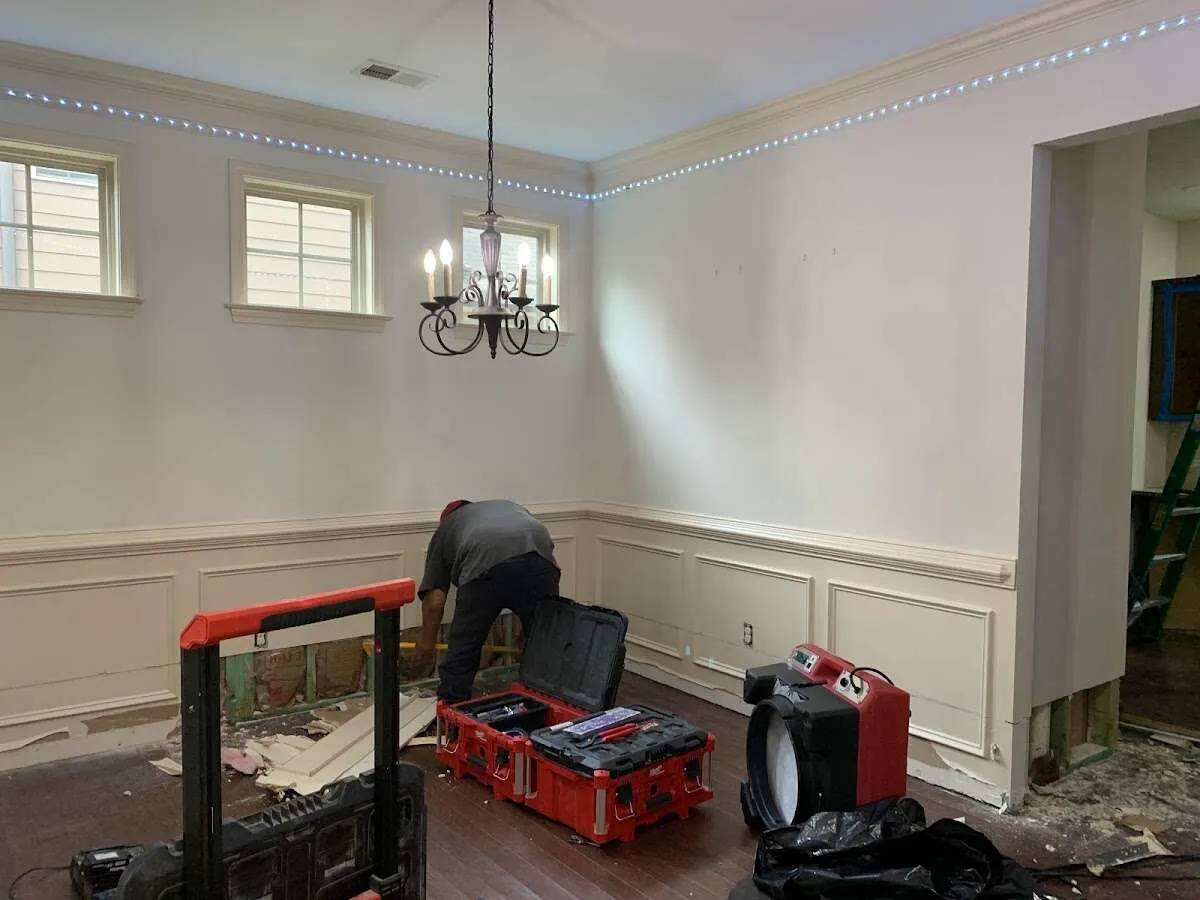 Restoration technician with professional equipment in Chesapeake Beach